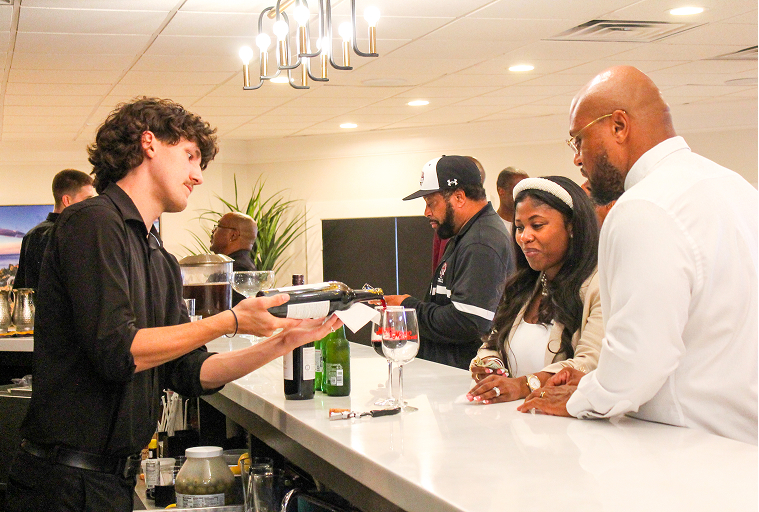 GRG staff serving guests at a Galveston Restaurant Group event