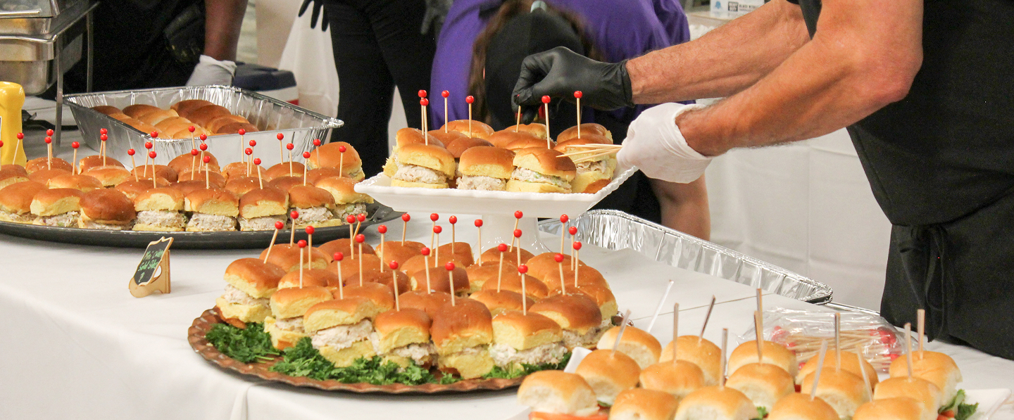 Tony Nonno Smecca tossing pizza dough at Mario's Seawall