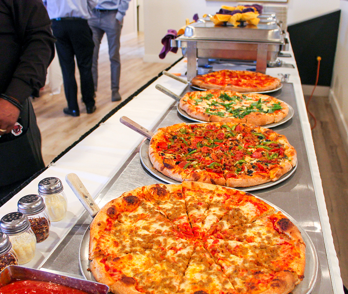 GRG catering buffet with pizzas and dishes for events